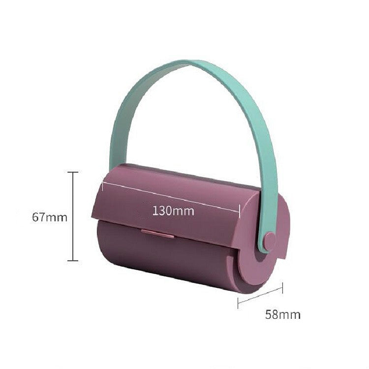 Handheld sticky lint roller with purple refill and teal loop handle