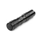 Black compact flashlight with front mesh grille and ridged, knurled handle rings