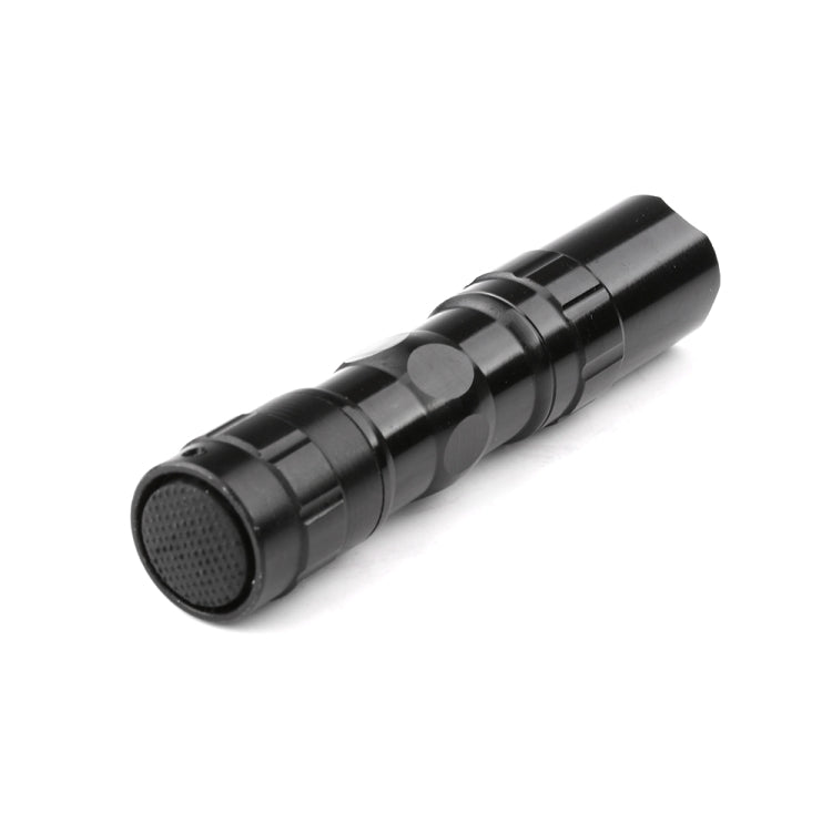 Black compact flashlight with front mesh grille and ridged, knurled handle rings