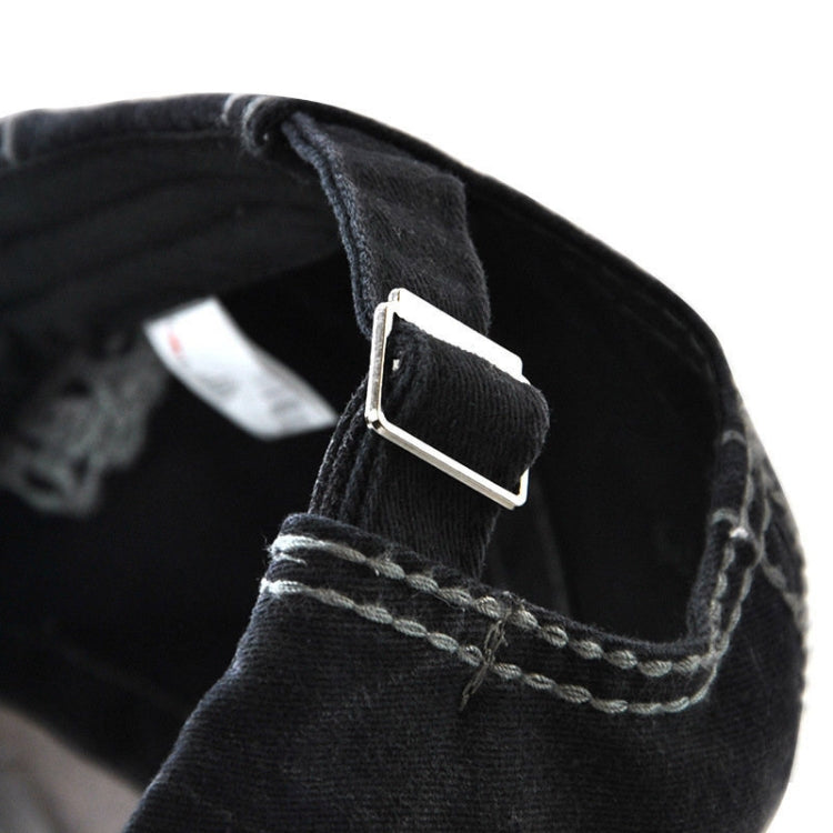 Cotton baseball cap side close-up with adjustable buckle strap and inner logo, black