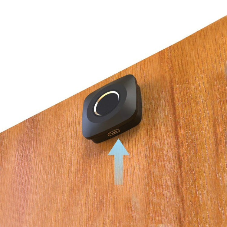 Black fingerprint drawer lock mounted on wood with illuminated ring