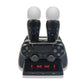 Black charging dock with two raised controller stands and accessory ports, front view