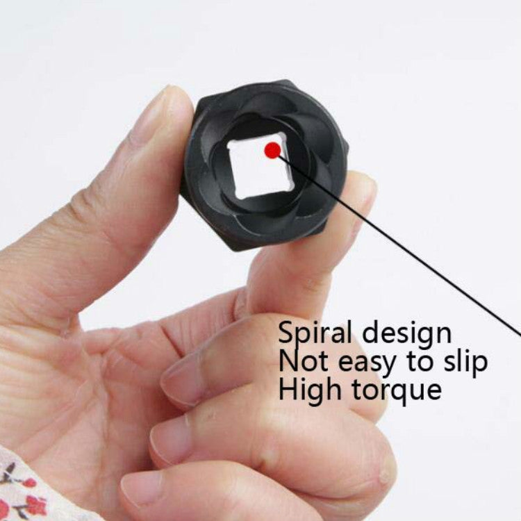 Handheld nut extractor socket with spiral pattern, held in a person’s hand