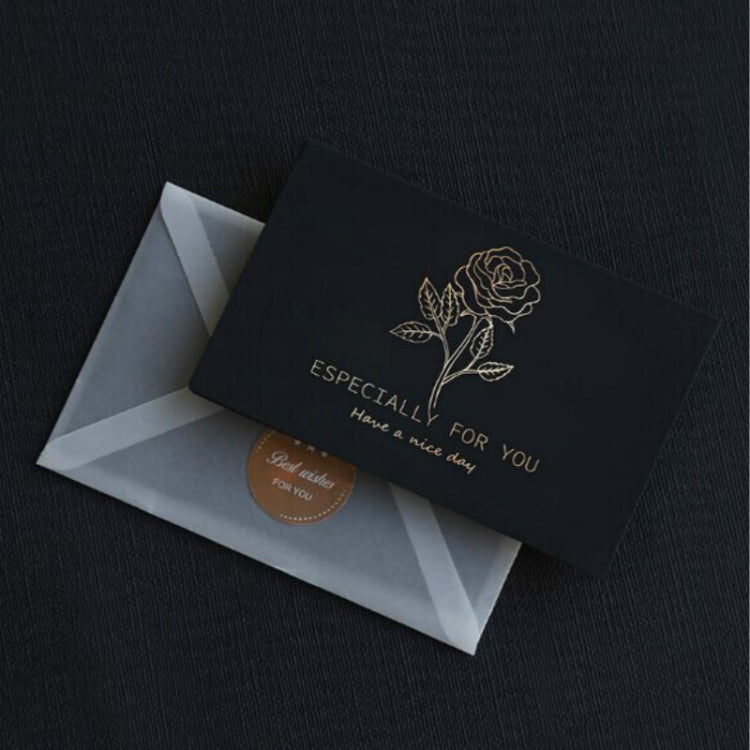 Black greeting card with gold rose design and “ESPECIALLY FOR YOU” text, with light envelope