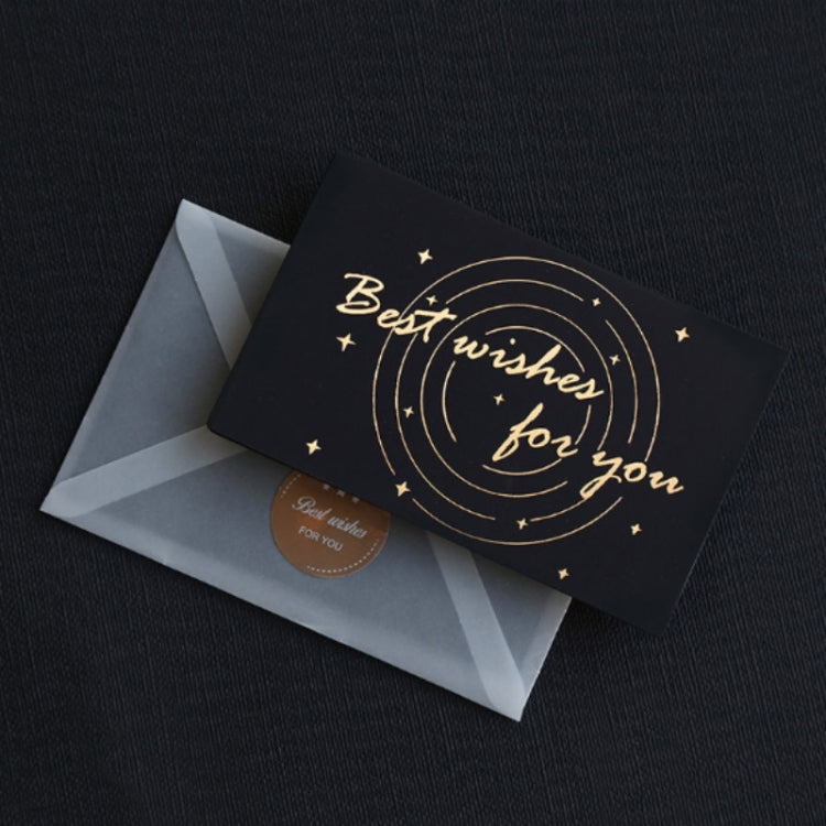 Bronzed “Best wishes for you” greeting card on black with circular gold design and envelope