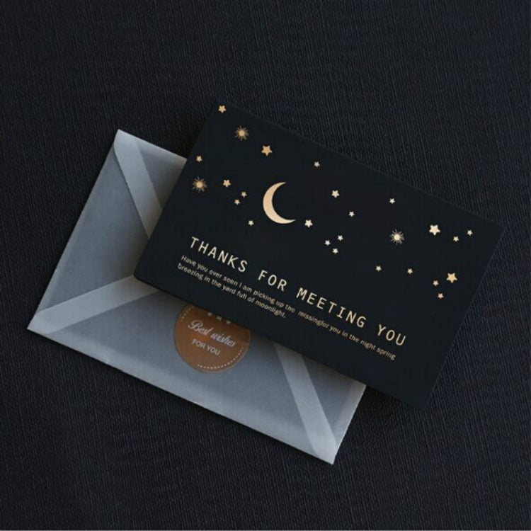 Black greeting card with gold crescent moon and stars and “THANKS FOR MEETING YOU”, plus envelope