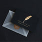 Black greeting card with gold feather graphic and “ESPECIALLY FOR YOU” text, with envelope