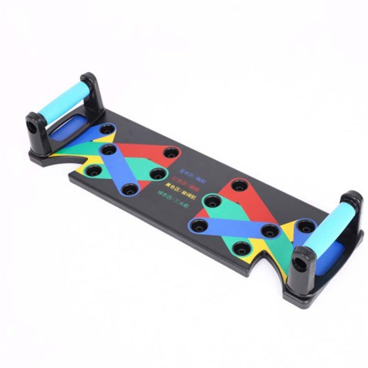 Push-up stand with multicolor board, blue handle grips, and black adjustable feet