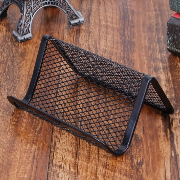 Black metal mesh business card holder with curved open stand, side view