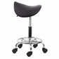 Black curved saddle seat stool with chrome post and caster wheel base