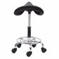 Black saddle chair with wide back support, chrome pedestal, and caster wheels