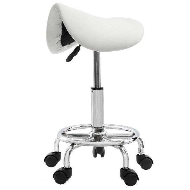 White saddle chair with black underside lever, chrome base, and caster wheels