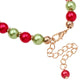 Red and green bead bracelet with lobster clasp and extender chain, small Santa hat charm