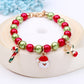 Beaded Christmas charm bracelet with red and green beads, Santa face and reindeer charms