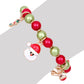 Beaded Christmas charm bracelet with red and green beads, Santa face charm and extender chain