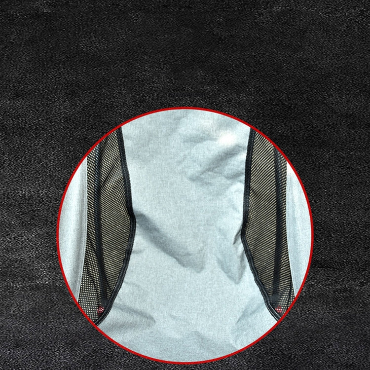 Light gray folding camping chair with black mesh side pocket detail