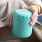 Teal stainless steel soup cup thermos with carry handle, close-up