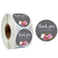Thank you seal sticker roll with floral business round stickers reading “thank you”