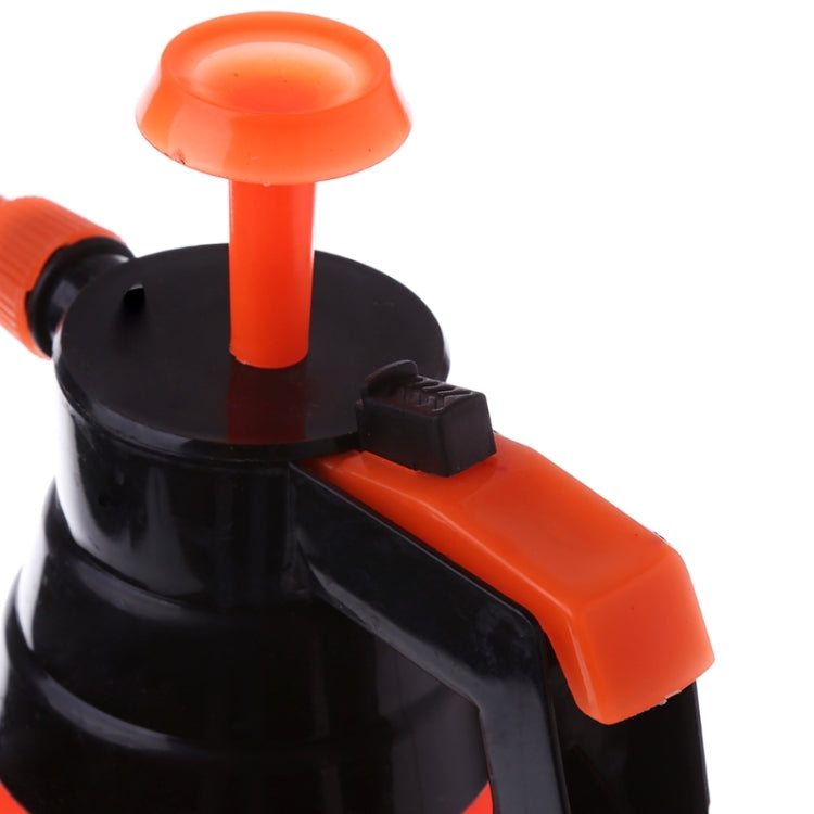 Orange and black sprayer top with push button and side spray lever