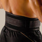 Worn black waist protector belt with wide strap over shorts