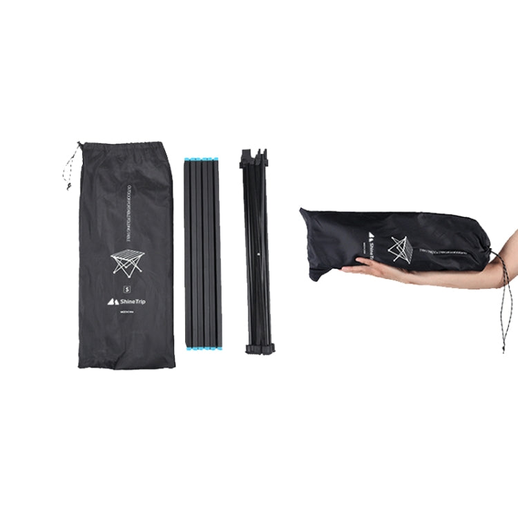 Folding camping table parts with black carry bag; folded legs and hardware included