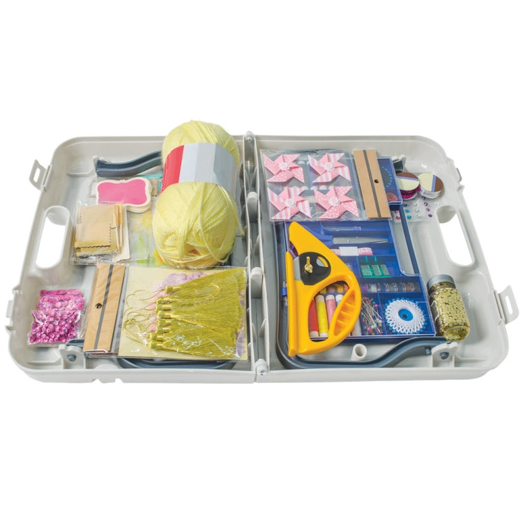 Open folding storage table with compartments filled with craft supplies