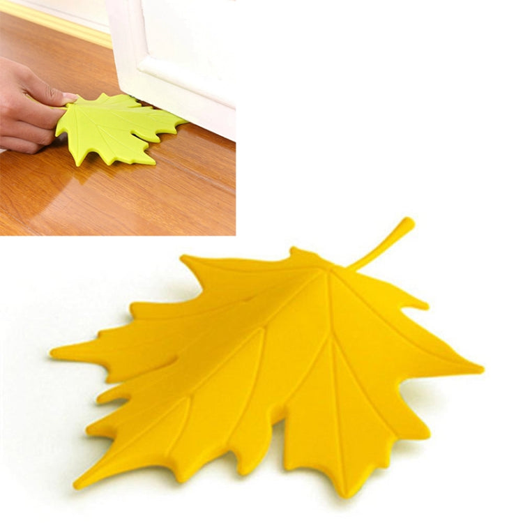 Yellow maple-leaf finger safety door stop with curved stem for holding doors