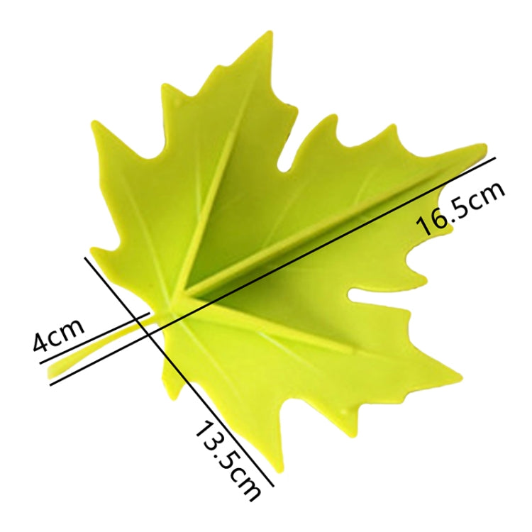 Green maple-leaf finger safety door stop with stem and leaf-shaped stopper