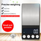 Compact electronic scale with brushed platform and buttons on black base