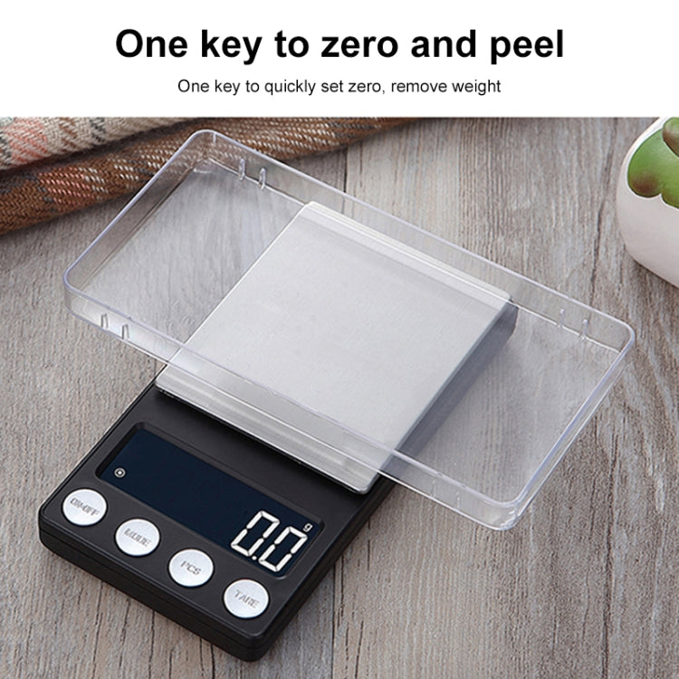 Digital scale with clear container attachment over the brushed metal weighing plate