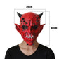 Red horned demon latex mask on face with snarling expression and white teeth
