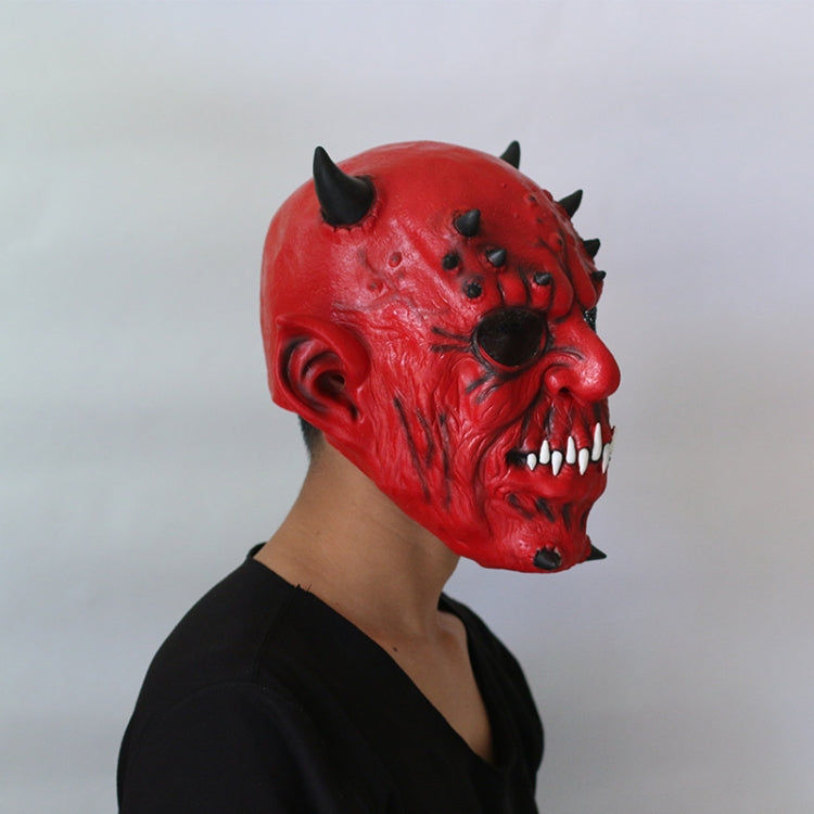 Side view red horned demon latex mask with fanged grin and black eye accents