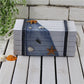 White wooden jewelry storage box with blue fabric side panel, starfish and seashell details