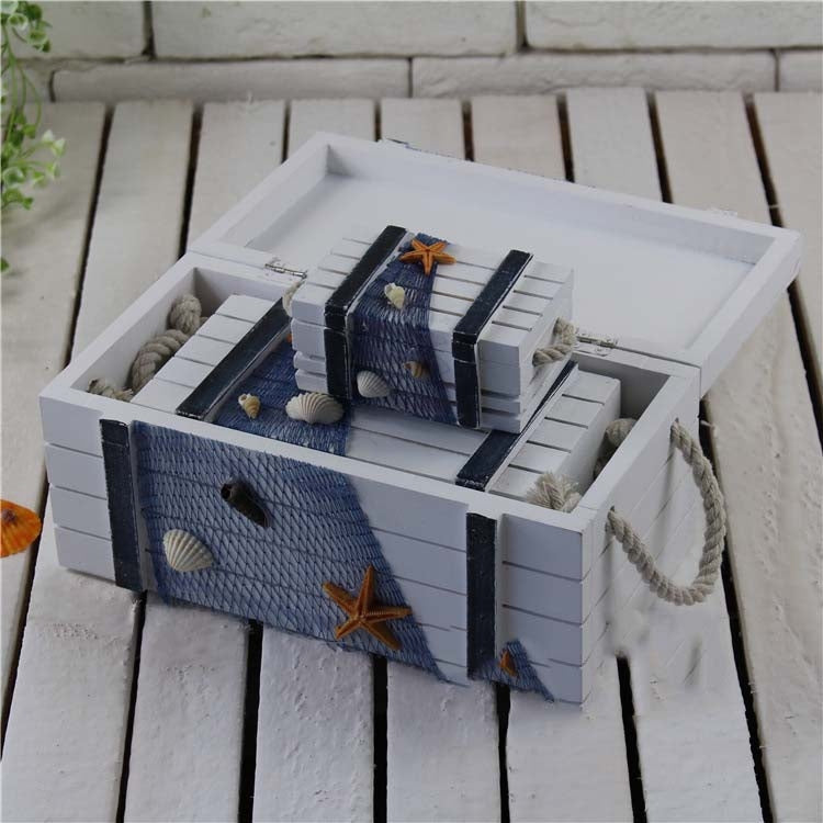 White-and-blue stacked wooden jewelry storage box with open tray and rope handles