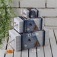 Stacked white wooden jewelry storage box with blue nautical fabric panels and rope handles