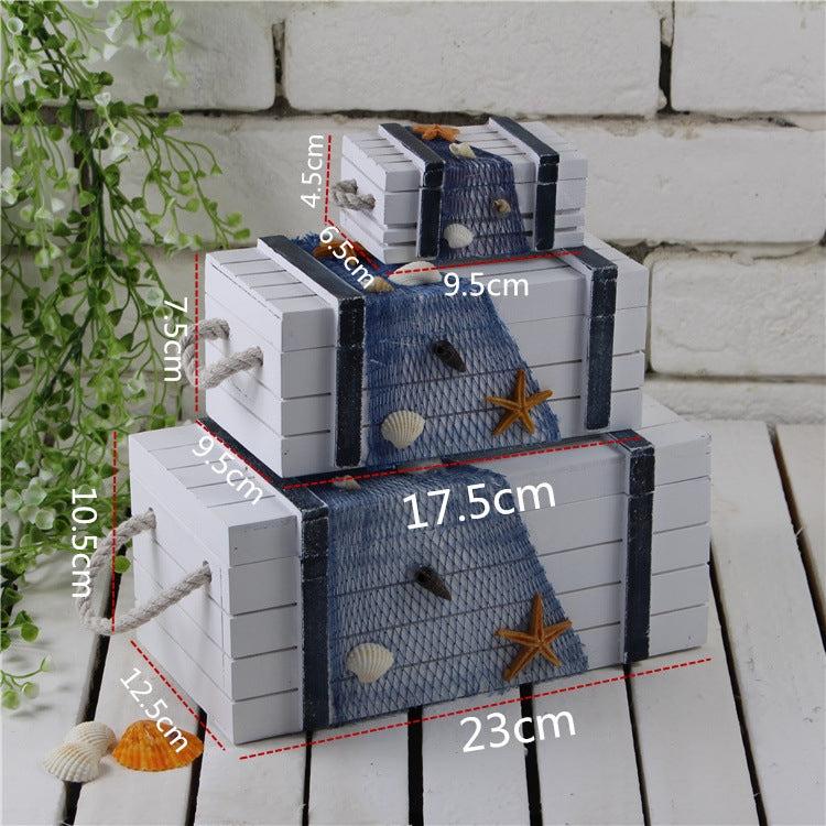 Stacked white wooden jewelry storage box with blue nautical fabric panels and rope handles