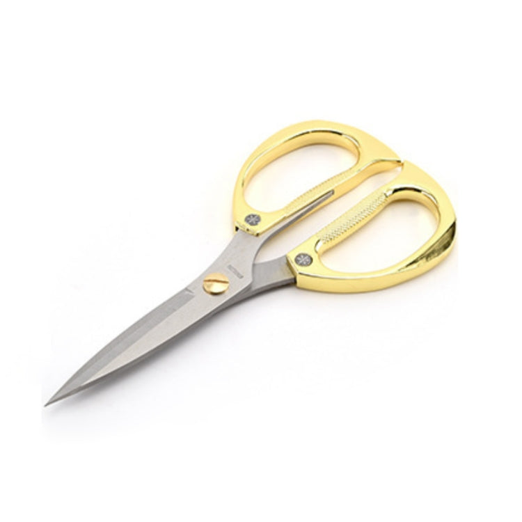 Gold stainless steel diamond scissors with textured grip handles and pointed blades