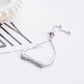 Silver stretch bracelet with bow centerpiece and sparkle band