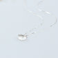 Sterling silver ginkgo leaf pendant on a fine chain