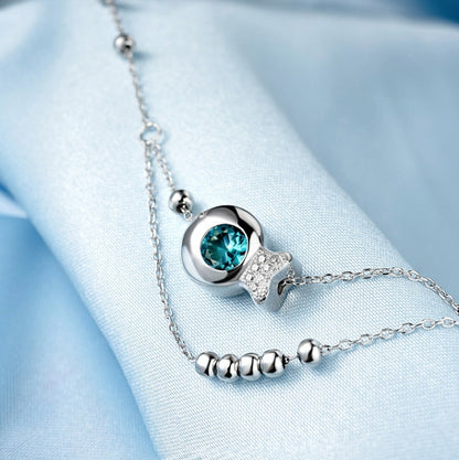 Girls white gold anklet with blue zircon double round charm and bead chain