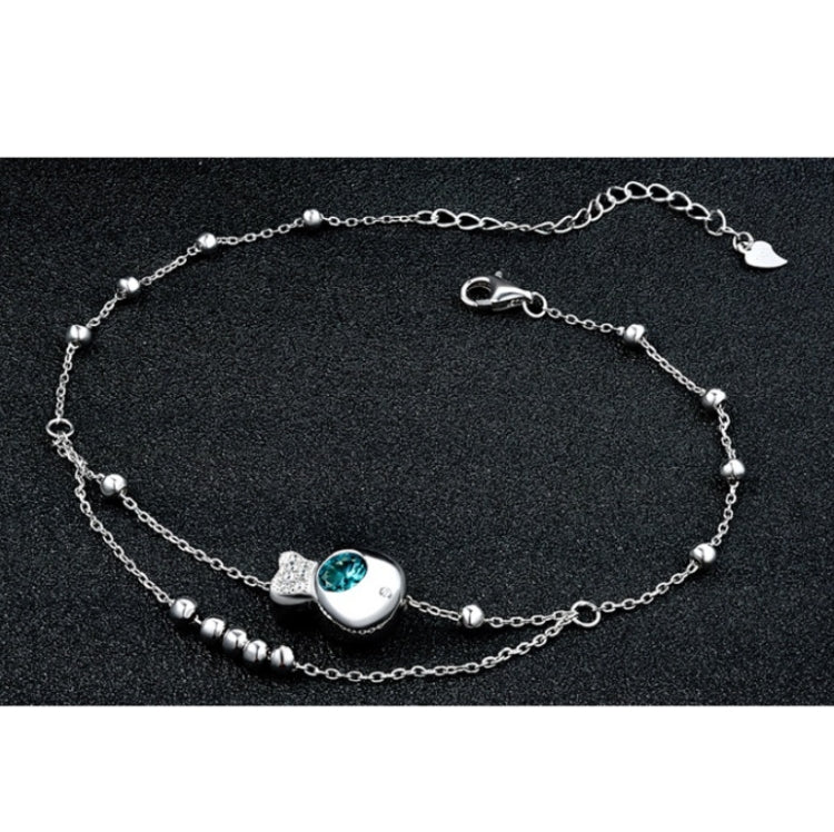 White gold girls anklet with blue zircon round charm and double chain bead links
