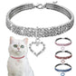 Silver rhinestone elastic pet collar with heart charm and clasp, plus matching collars shown