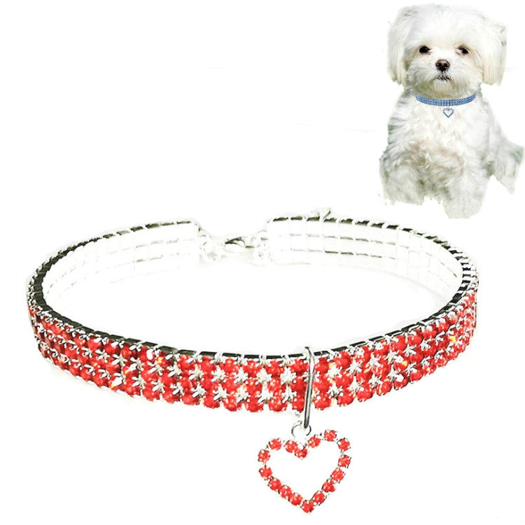 Red jeweled elastic pet collar with heart charm pendant and buckle clasp