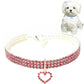 Pink jeweled elastic pet collar with heart charm pendant and buckle clasp