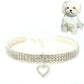 White rhinestone elastic pet collar with heart charm and center clasp, adjustable stretch fit