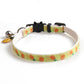 White fruit pattern cat collar with black buckle and small bell charm