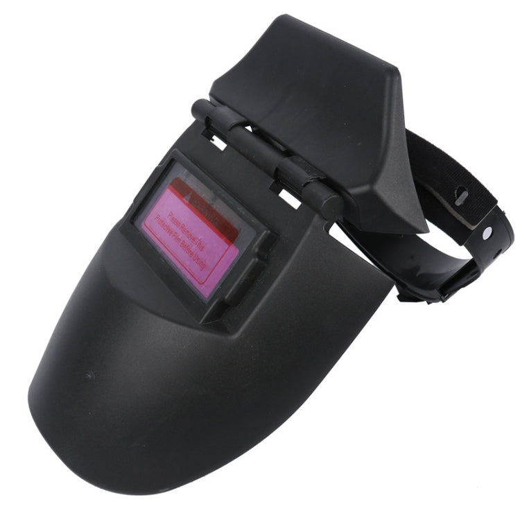 Auto-darkening welding helmet, side view with adjustable headgear and dark visor