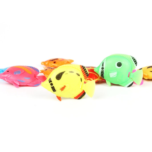 Assorted colorful plastic tropical fish toys, five fish in a row