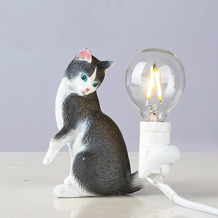 Cat mini night light: black-and-white cat figure holding a glowing light bulb