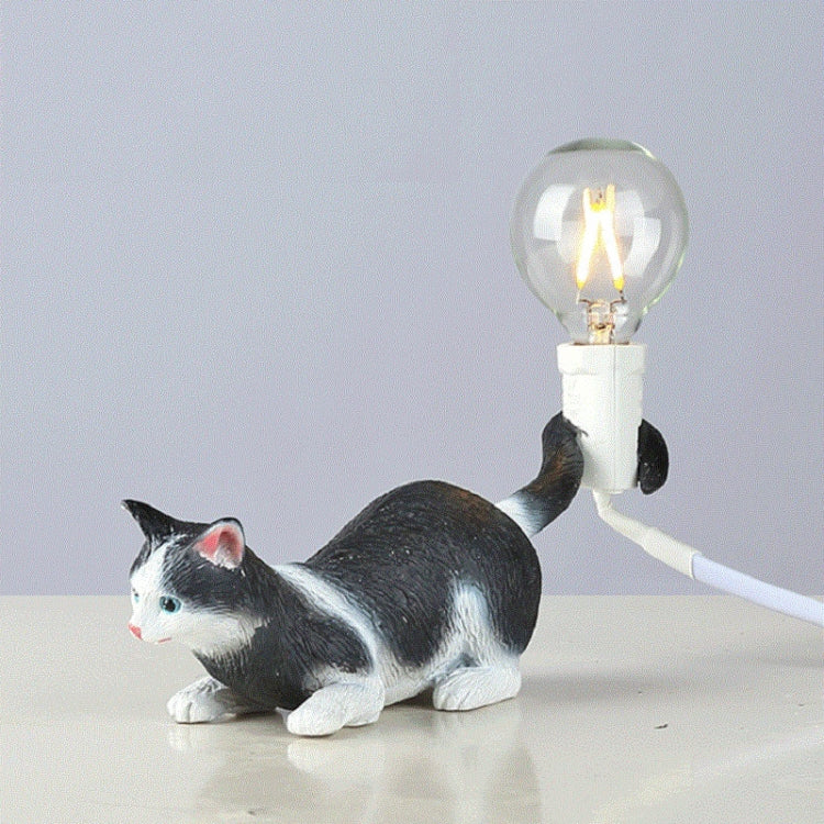 Cat mini night light: black-and-white cat lying down with glowing bulb on white base